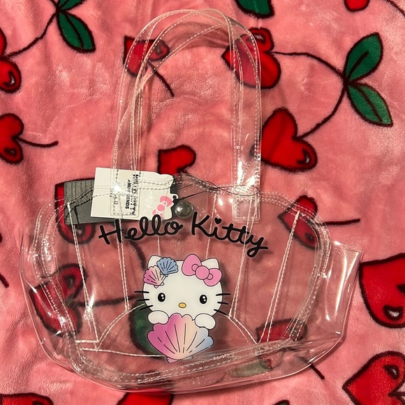 Hello Kitty Handbags - Hello kitty clear small bag! Hello kitty with sea shell.
